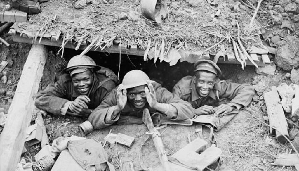 238_Three black soldiers in a German dug-out captured during the Canadian advance east of Arras October, 1918